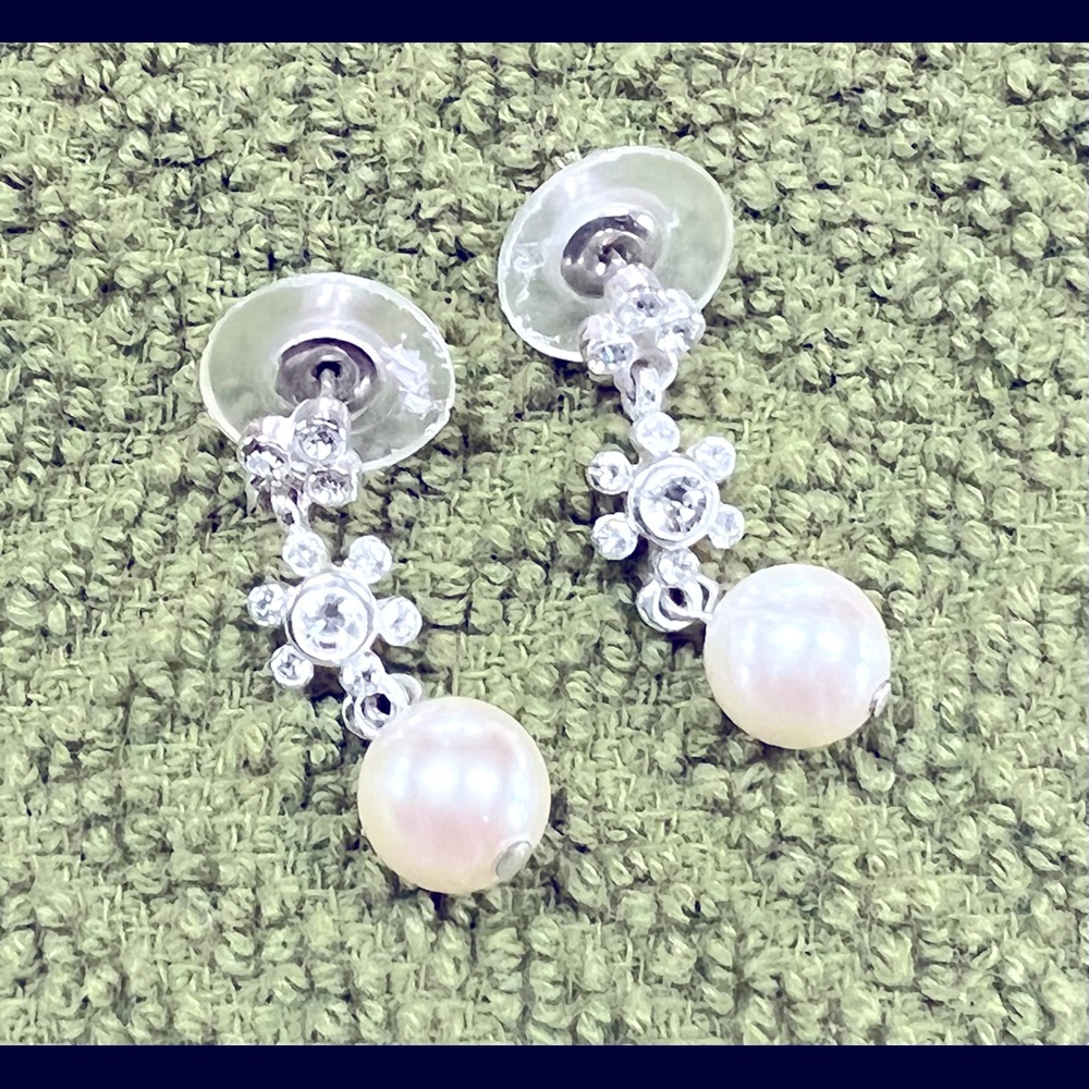 Dainty drop pearl like earrings with small crystals